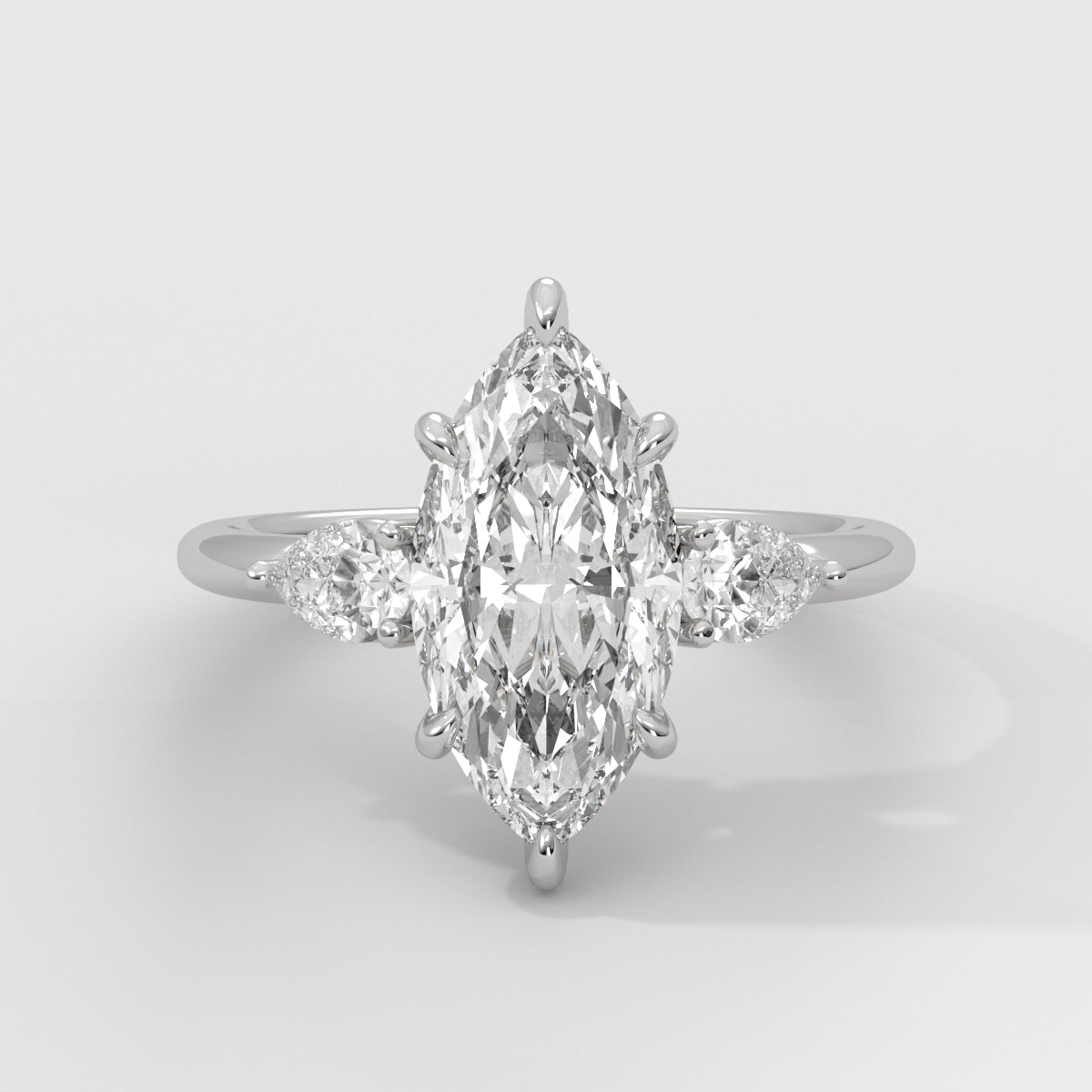 Anillo de Compromiso Sidestones Marquise