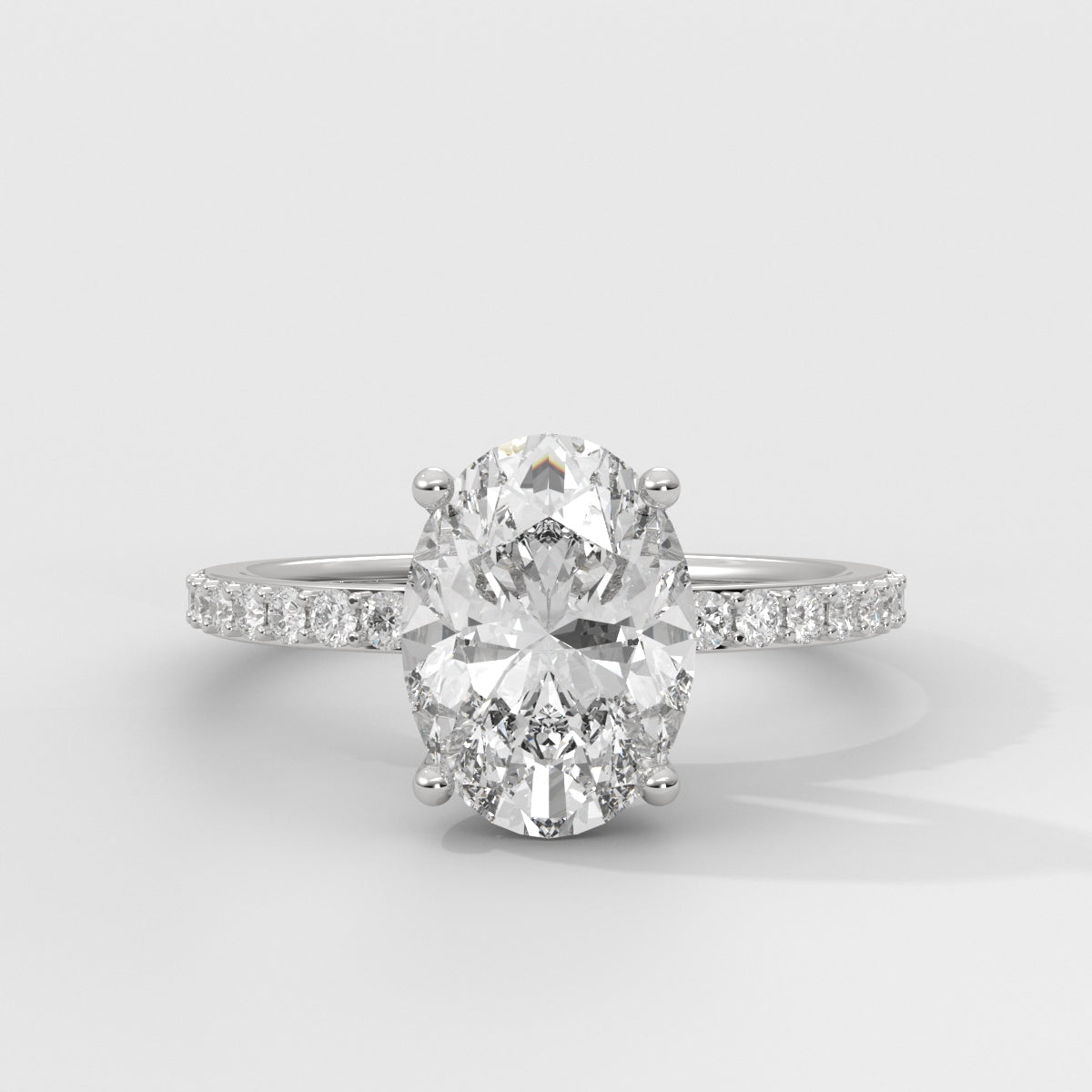 Anillo de Compromiso Sidestones 1.50 mm Oval