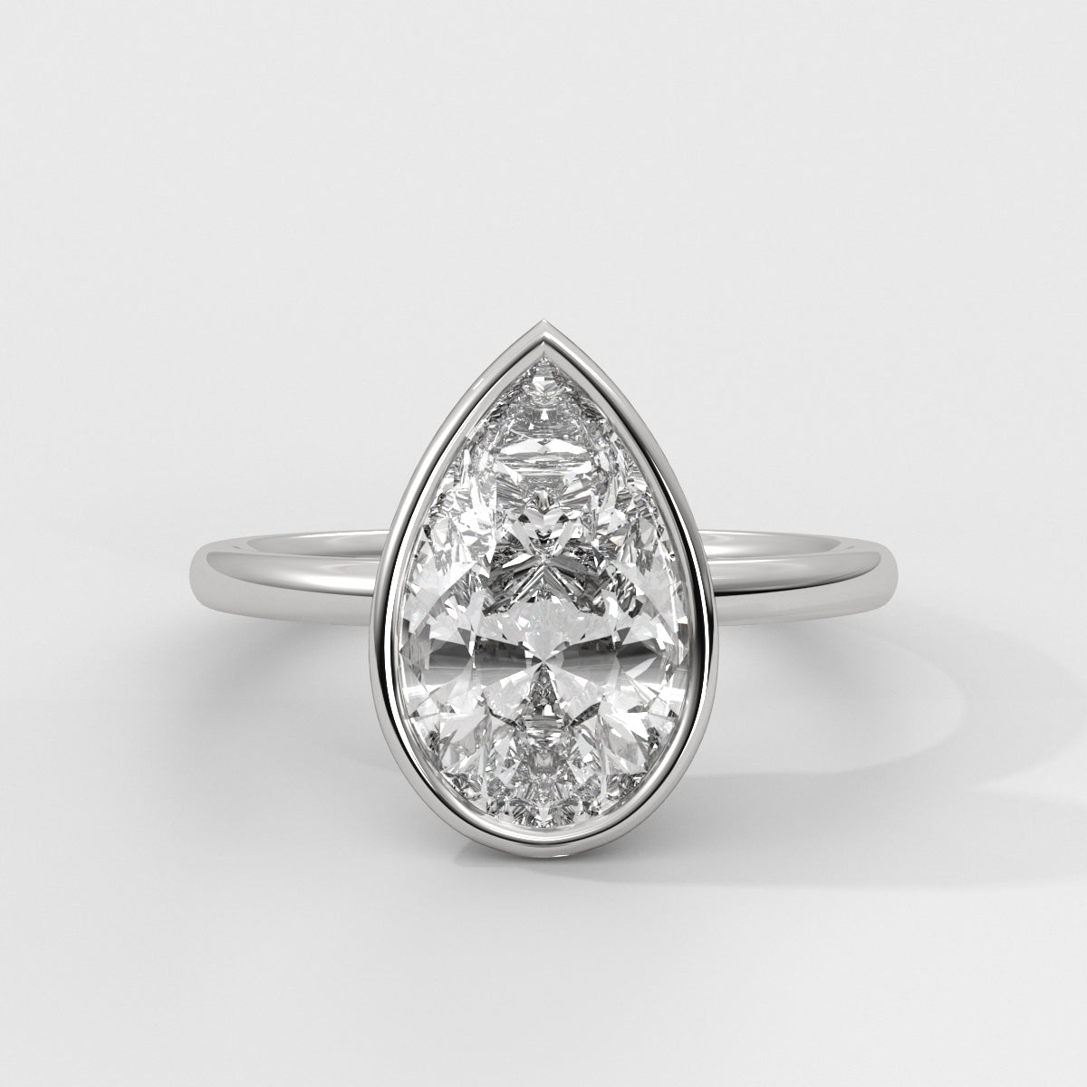 Anillo de Compromiso Solitario Bezel Set Pear