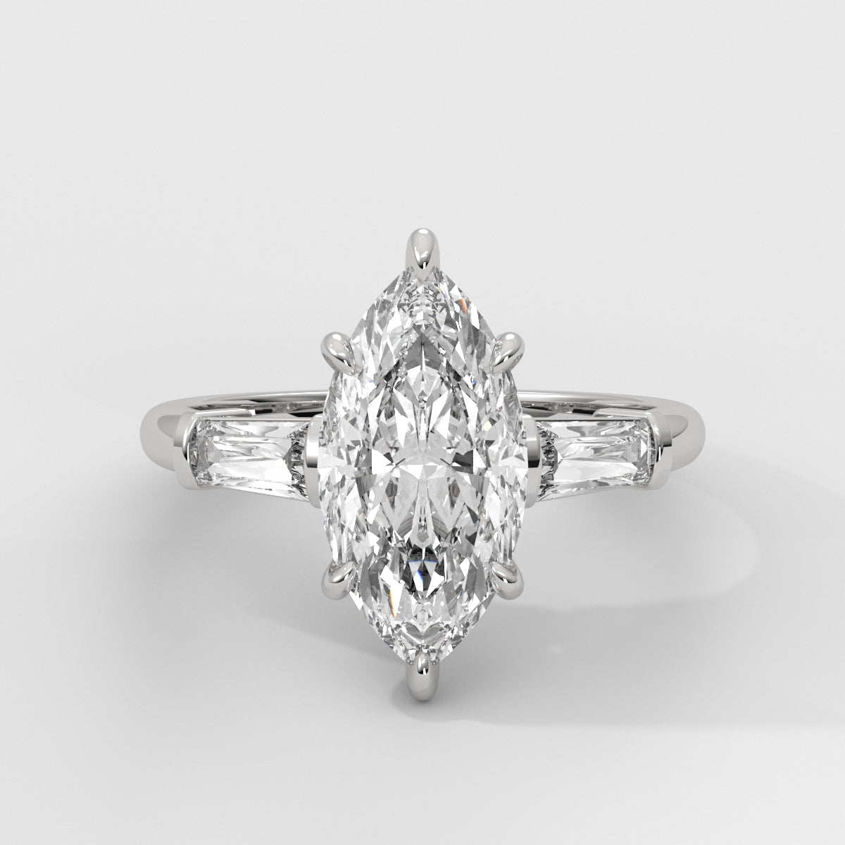 Anillo de Compromiso Baguette Sidestones Marquise