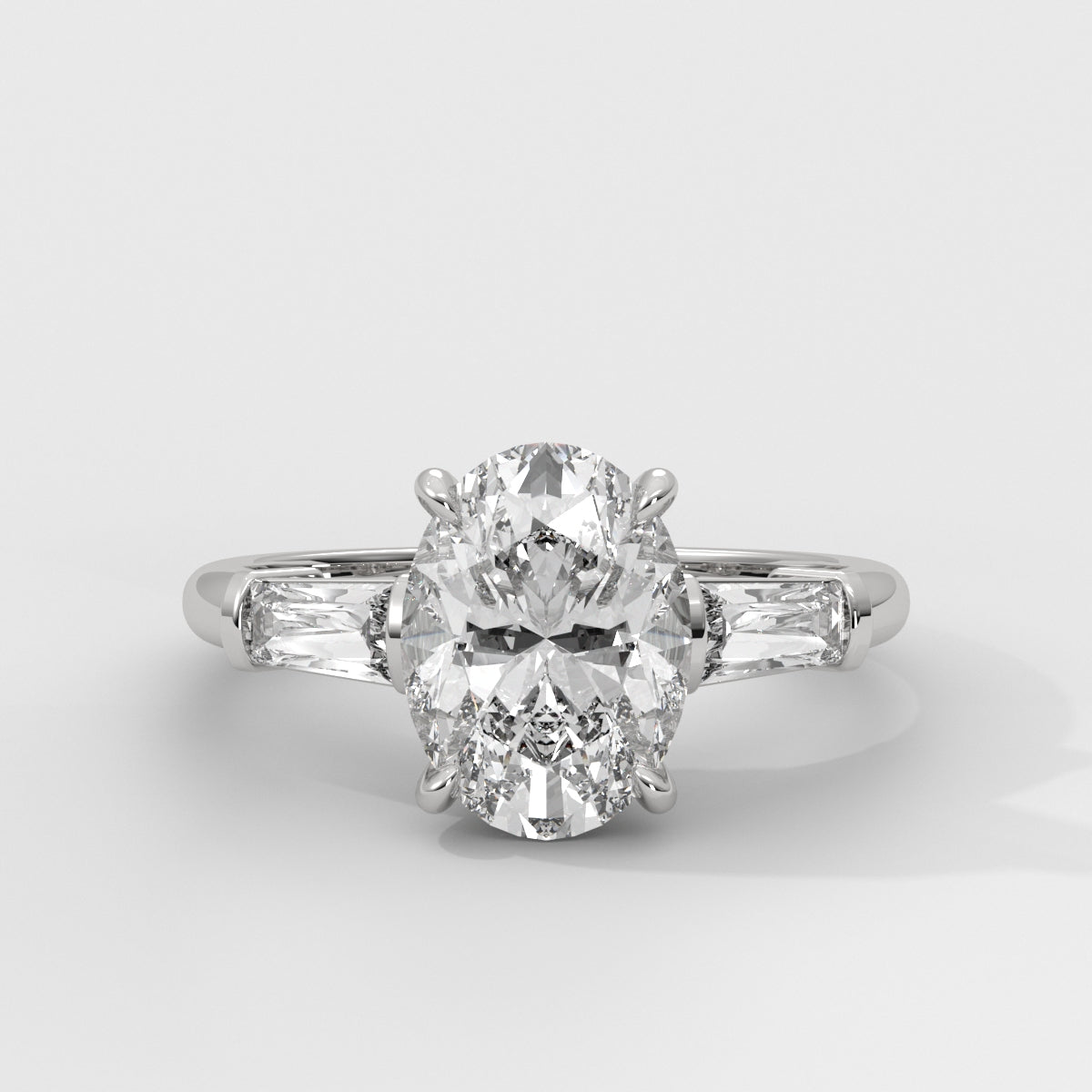 Anillo de Compromiso Baguette Sidestones Oval