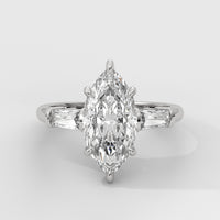 Anillo de Compromiso Baguette Sidestones Marquise