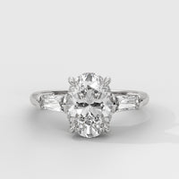 Anillo de Compromiso Baguette Sidestones Oval