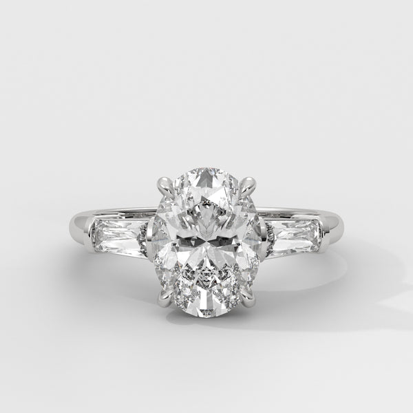 Anillo de Compromiso Baguette Sidestones Oval