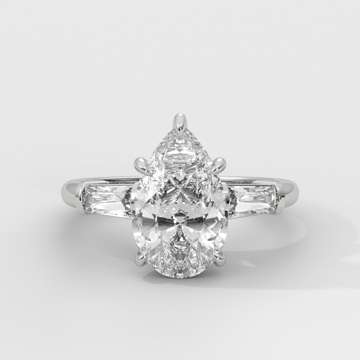 Anillo de Compromiso Baguette Sidestones Pear