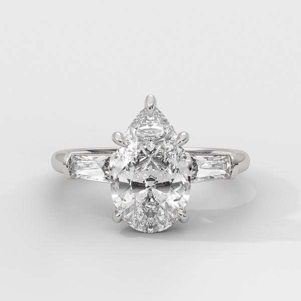 Anillo de Compromiso Baguette Sidestones Pear