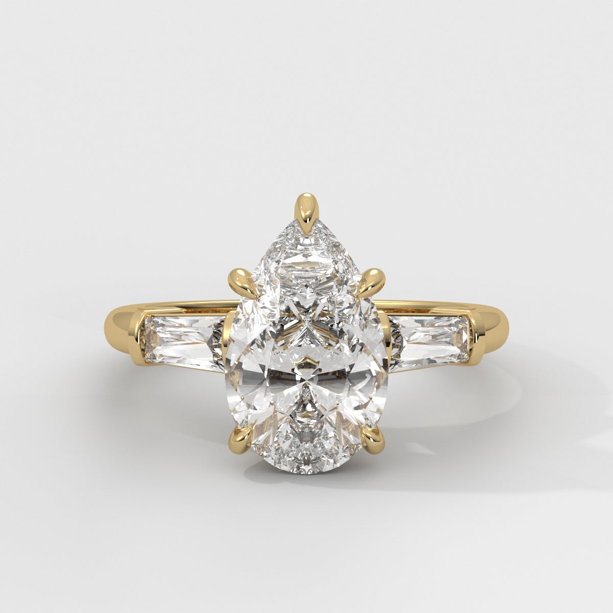 Anillo de Compromiso Baguette Sidestones Pear