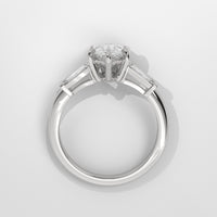Anillo de Compromiso Baguette Sidestones Pear