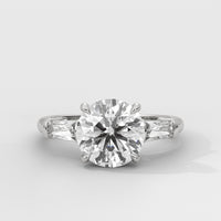 Anillo de Compromiso Baguette Sidestones Round