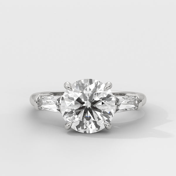 Anillo de Compromiso Baguette Sidestones Round