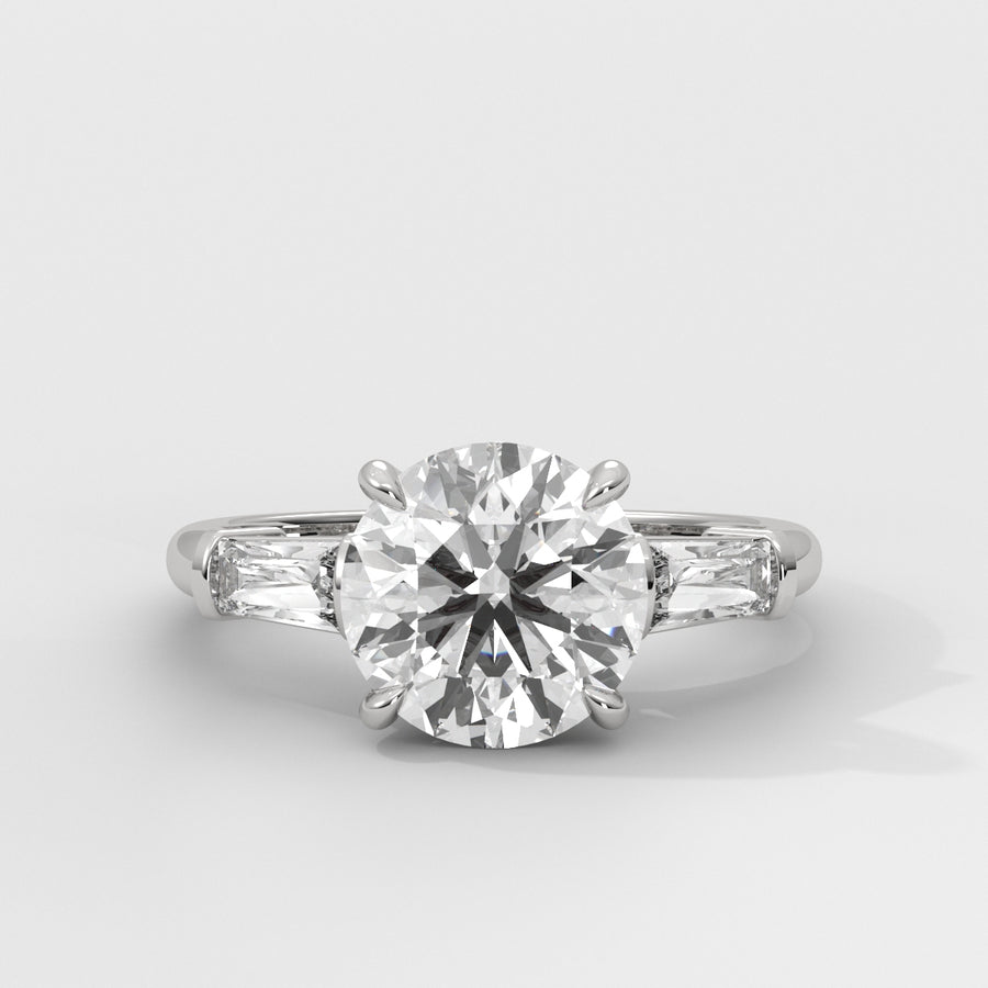 Anillo de Compromiso Baguette Sidestones Round