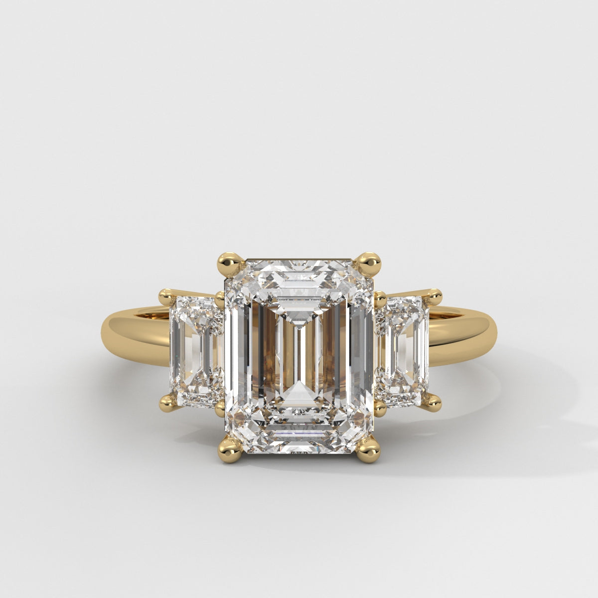 Anillo de Compromiso Three Stone Emerald